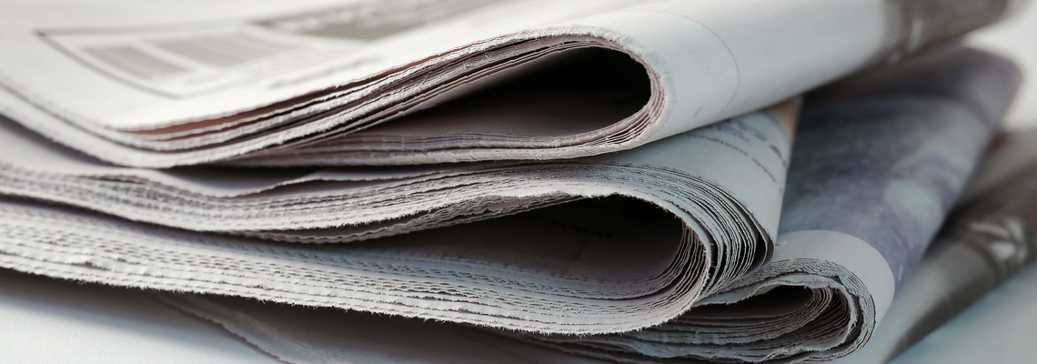 Closeup Of Folded Newspaper