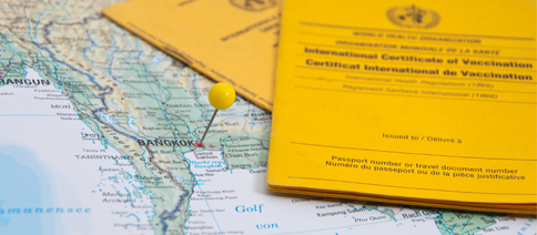 Map with a pin and passports for travel