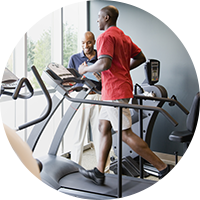 Man jogging on treadmill circle image for back injuries