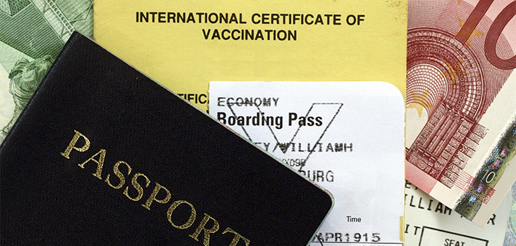 Passport and boarding pass with an international certification of vaccination